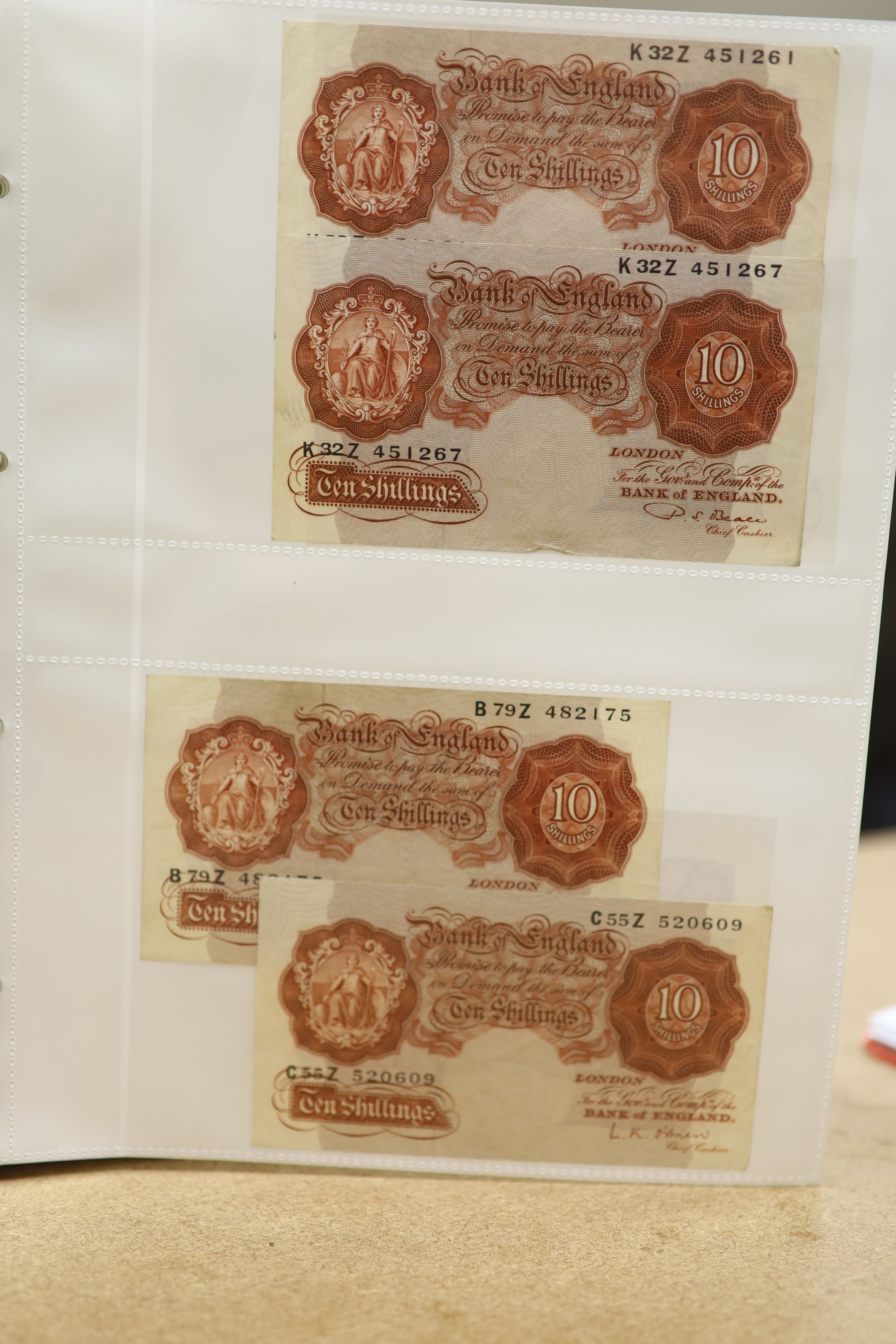 A collection of Bank of England and Scottish banknotes to include: 21 QEII 10 shillings, 14 O'Brien and Beale 10 shillings, 1 Peppiatt 10 shillings, 4 Hallam one pound notes, 18 O'Brien or Beale one pound notes, 8 Peppia